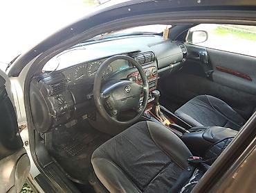 kayu moto: Opel Omega: 2.5 l | 1997 il 300000 km Sedan — 7