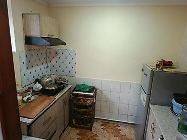 suraxanida: Həyət evi – geniş həyət qapısı və hasarla çevrili sahə. köhnə Suraxanı — 3