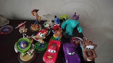 saxda baba səkilləri: Disney Infinity fiqurları kolleksiyası Məzmun: - Toy Story: Woody — 1