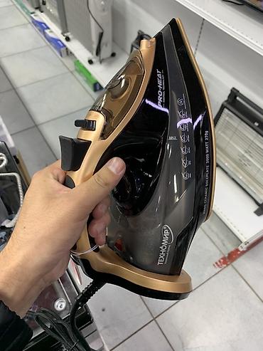 3000: Утюг Technomir, Паровой, Металлокерамический, Самоочистка — 1