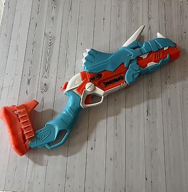 tapança oyuncaq: Nerf DinoSquad (Tricera‑Blast) köpük ox atan blaster - Dinozavr — 1