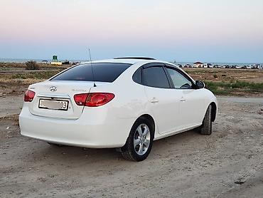 92: Hyundai Elantra: 2 l | 2009 il Sedan — 2