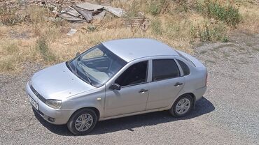 купить лада калина универсал: Автомобиль LADA Kalina в кузове седан, выполненный в серебристом