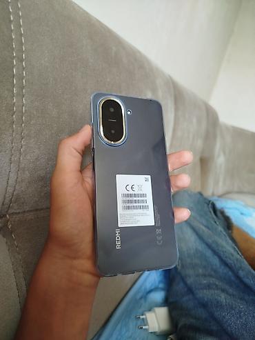 oyun kon: Redmi A5, 128 GB, rəng - Qara, Barmaq izi, İki sim kartlı — 2