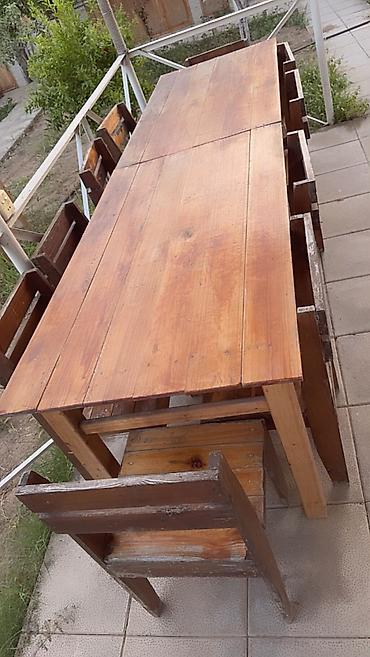 mebel stol stul: Tecili satilir. Taxta lakli. Uzun 10 neferlik masa. 10 oturacaq. Bu — 2