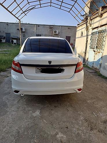 byd qin plus: Saipa Saina (sedan), ağ rəng. Masin Mastaga erazisinde yerlesir, tam — 7