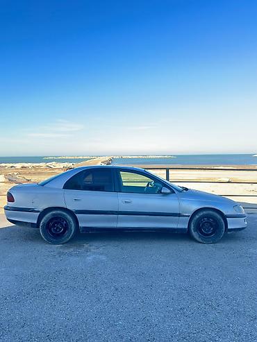 Opel: Opel Omega: 2 l | 1999 il Sedan — 4