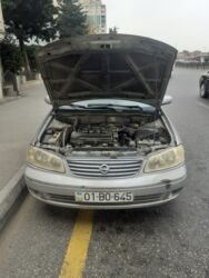 Nissan: Nissan Sunny: 1.3 l | 2006 il Sedan — 4