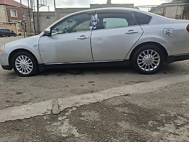 nomre satışı: Nissan Teana sedan - Kuzov: 4 qapılı sedan, iri ölçülü salon - Rəng — 9