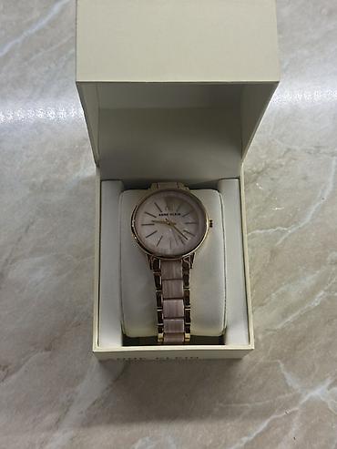 Aksesuarlar: Anne Klein qadın qol saatı - Brend: Anne Klein - Korpus: qızılı tonlu — 1