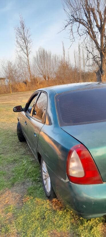 Daewoo: Model: Daewoo Nubira sedan (yaşıl rəng) Kuzov: 4 qapılı, sedan — 5