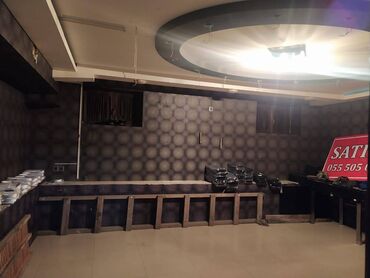 Mağazalar: Binəqədi rayon ərazisində 4 mərtəbəli tam təmirli, 700 kv sahəsi olan — 3