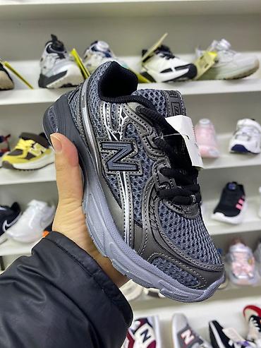 Детская обувь: Кроссовки и кеды — широкий выбор моделей на полках магазина. - — 5