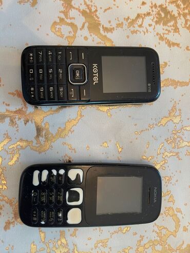 telefon kabloku: Nokia 105 4G, 2 GB, цвет - Черный, Битый, Кнопочный, Две SIM карты