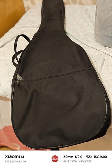 aaok 13000 puff: Az işlənmiş gitara çantası öndə cibində var. cırıqi yoxdur — 5