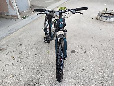 İdman velosipedləri: Dağ velosipedi – 24” təkərlər, enli protektorlu şinlər. Rəng: tünd — 7