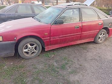210 4.3: Mazda 626: 1991 г., Седан — 1