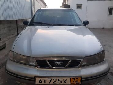 фары для нексии: Автомобиль Daewoo Nexia серебристого цвета с кузовом седан. Оснащен