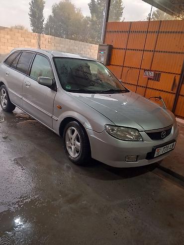 х5 м: Mazda Familia: 2001 г., Бензин, Универсал — 6