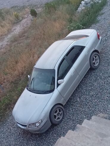 corolla runx: Mazda Capella: 2001 г., 1.8 л, Механика, Бензин, Седан