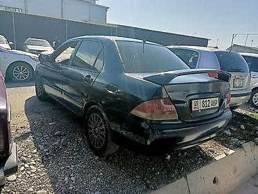 Mitsubishi: Mitsubishi Lancer: 2006 г., 1.6 л, Механика, Бензин, Седан — 2