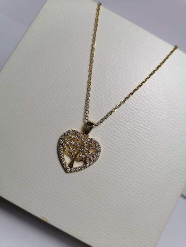 Ogrlice: Nakit, hiruški čelik
Cena 1100din — 12