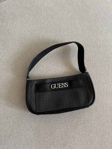 canavar dərisindən qadın şubaları: Əl çantası, Guess, İşlənmiş