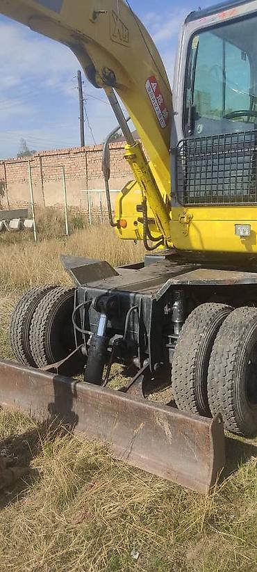 Экскаваторы: Экскаватор, 2013 г., Колесный — 28