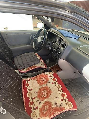 mazda 626 1990: Nissan Primera: 2000 г., 1.8 л, Механика, Бензин, Седан — 6