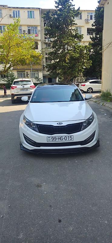 kia carnival: Kia Optima – ağ rəng, sedan, idman üslublu eksteryer paketli. Əsas — 10
