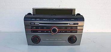 pregrada za klimu: RADIO / CD PLEJERI MUZIKA ZA MAZDA 3 — 1