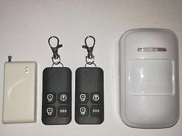 apple 11: Bežični kućni alarmni sistem sa auto-dial funkcijom Komplet sadrži: - — 10
