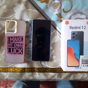 Hummer: Redmi 12, 128 ГБ, цвет - Голубой, Кнопочный, Сенсорный, Отпечаток пальца