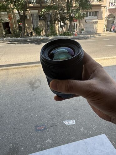 Информатика: "Sigma 35mm f/1.4 DG HSM" linza Hec bir problemi yoxdur yeni