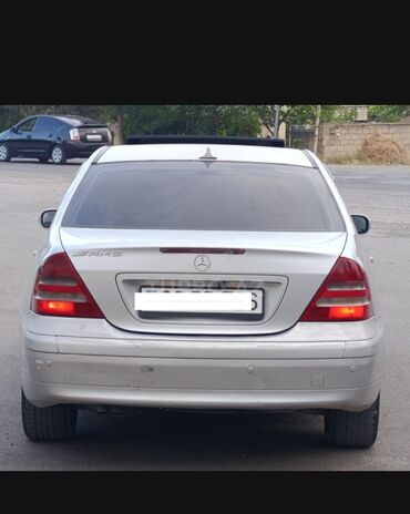 Mercedes-Benz: Mercedes-Benz C-Class sedan (W203), gümüş rəng. - Kuzov: 4 qapılı — 6