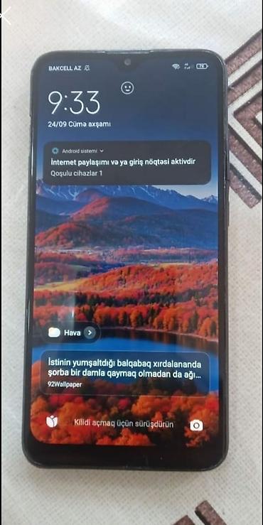 Mobil telefonlar: Redmi 8A yüngül arxa kirişqasında catlar var bide barmak izi işlemir — 1