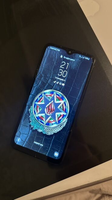 Aş qazanı: Samsung A10e, 32 GB, rəng - Qara, Sensor, Barmaq izi, İki sim kartlı