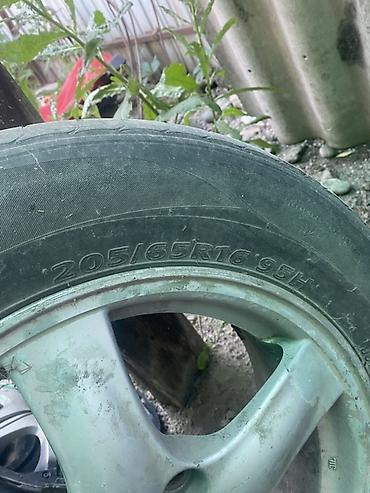 20555 р16: Легкосплавный диск с шиной - Шина: 205/65 R16 95H, Radial Tubeless - — 2