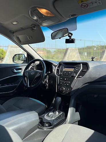 musiqili sükan: Hyundai Santa Fe (3-cü nəsil) – ağ rəngli, şəhər və uzun yol üçün — 4