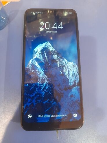 телефон флай 7: Xiaomi Redmi Note 7, 64 ГБ, цвет - Черный, 
 Отпечаток пальца
