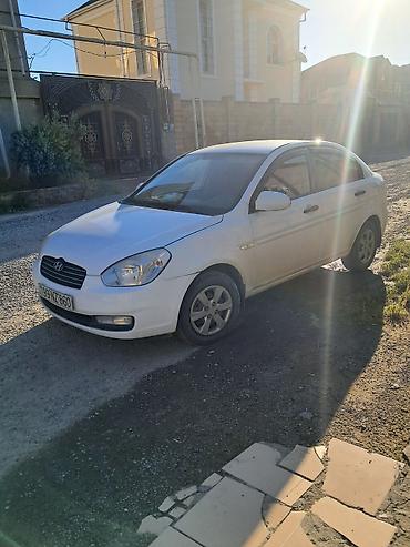 Hyundai: Hyundai Accent: 1.4 l | 2010 il Sedan — 8
