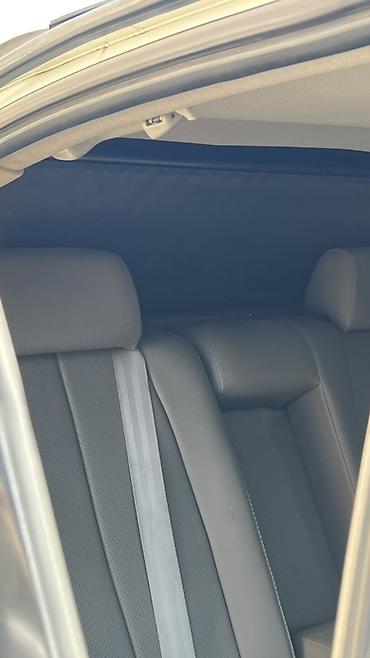 Nissan: Nissan Maxima QX sedan – ağ rəng, 4 qapı, qabaqdan ötürücülü. Əsas — 9