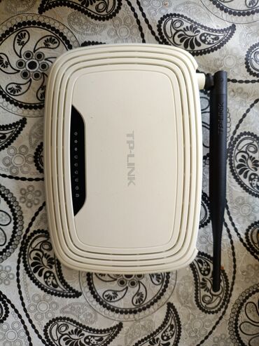 adsl modem купить: TP-Link TL-WR740N model simsiz N router, 150Mbps sürətə malikdir