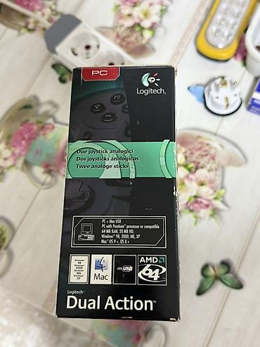 nintendo controller: Logitech Dual Action — проводной геймпад для ПК и Mac. Особенности: - — 3