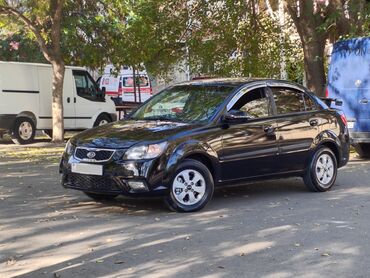 авто фольксваген пассат: Kia Rio: 1.5 л | 2010 г. Седан