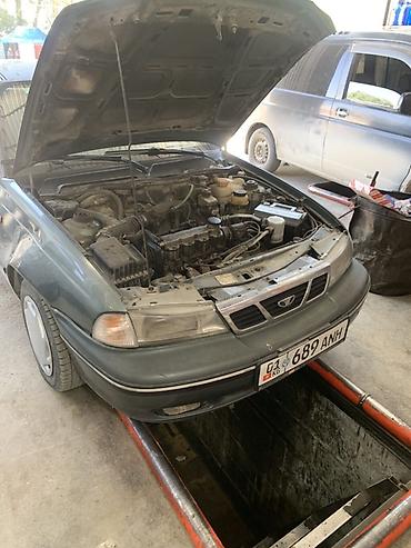 Унаа: Daewoo Nexia: 2005 г., 1.5 л, Кол менен иштөөчү, Бензин, Седан — 4