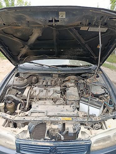 обвес 6 3: Mazda 626: 1994 г., 1.8 л, Механика, Бензин, Лифтбек — 8