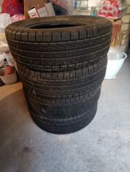 шины для экскаватора: Резина кышкы и поликтер сатылат