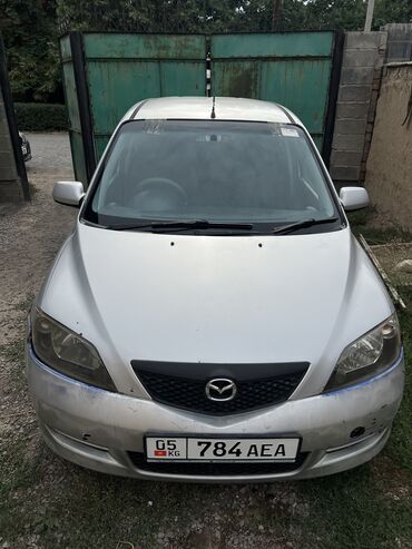машиналар: Mazda Demio: 2002 г., 1.3 л, Механика, Бензин, Хетчбек
