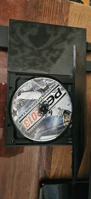 как купить игру в playstation store азербайджан: Sony PlayStation 2 oyun konsolu əsasən qara rəngdədir və nazik dizayna